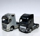 Set Of 2 Volvo Fh5 Globetrotter Xl black  silver  Wsi Truck Models