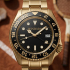 Winborn Montier Gold Tone Watch Black Dial 24 Hour Bezel Date Bracelet