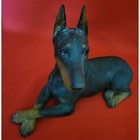 Sandicast Black Doberman Pinscher  Sitting Dog Sculpture