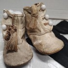 Antique White Leather Button Baby Shoes And A Black Pair Of Antique Socks