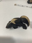 Handmade Wooden Painted Skunk Figurines Lot Of 4 Folk Art Vintage