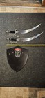 Used Wall Mount Scull And Real Swords 