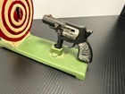 Cast Iron Mechanical Shooter Coin Bank Revolver Gun   Bullseye Target