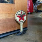 Texaco Cast Iron Doorstop With Painted Antique Finish  9 5  Tall 