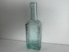 Antique Cha  H  Fletcher s Castoria Aqua Glass Embossed Medicine Bottle