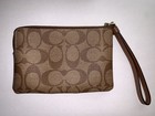 Coach Outlet Corner Zip Wristlet In Signature Canvas