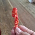 Unusually Shaped Hot Cheeto Piece   Bart Simson Look Alike