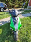 2024 Green Bintelli Scorch 49cc Moped  Helmet And New Cover In Box  17 Miles
