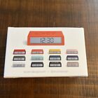 New Lexon Flip  Plus Travel Reversible Lcd Alarm Clock New Sealed Orange Lr151o1