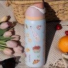 Owala Freesip 32 Oz  Stainless Steel Water Bottle     Picnic Prep  Macaroon Blue 