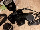 2 Cameras A  Sony And A Canon With High Performance Lenses And Accessories  Lot