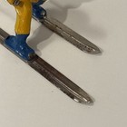 Vintage Barclay Lead  man On Skis  In Yellow With Blue Trim 