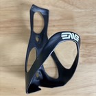 Enve Carbon Water Bottle Cage   Matte Black With White Logos     read    Mounted