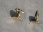 Gold Tone Cuff Links With Small White Stone