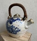 Large Japanese Porcelain Glazed Asian Motif Teapot  W woven Handle  Meiji Period