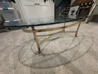 Ethan Allen Brass And Glass Oval Coffee Table 50 l X 28 w X 16 h