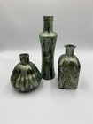 Three Decorative Glass Bottles Or Vases