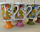 Four Vintage 1970s Arnart Hippie Flower Girl Footed Mugs