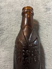Vintage Chocolate Soldier All Embossed Brown 6oz Soda Bottle  Figural Solder Pic