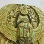 Vintage-style Scarab Relief Symbolizing Rebirth In Ancient Egyptian Culture