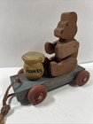 Vintage Jointed Wooden Bear W honey Pull Toy   Wheels   Has A Pull String Rustic