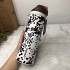 The  cowgirl Core  Owala Special Edition 24oz Freesip Animal Print Cow Brown