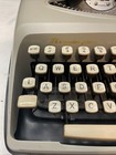 Vintage Remington Envoy Typewriter  Good Condition Beige W  Black Case