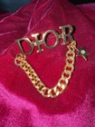Christian Dior Gold Brooch Metal Crystal Logo