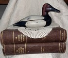 Antique Books And Wooden Carved Duck With Handmade Doily Vignette 
