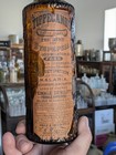    labeled    Amber Warner s Safe Cure Tippecanoe Bitters Bottle