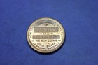 Token-medal-tuit-abbott s