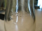 Vintage Half Pint Liquid Glass Milk Bottle - Diamond Raised Logo On Bottom