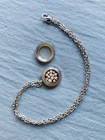 Small Silver-tone Crinoid Star Fossil Locket Necklace