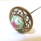 Antique Hatpin Openwork Brass Flowered Glass Center