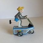 Mechanical Tin Lithograph Wind-up Boy On A Scooter With Key