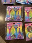Vintage Lisa Frank Party Favor Lot Puzzle Watches  Bags  Paddle Balls  Puzzles 