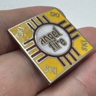 Vintage Angel Fire Ski New Mexico Zia Sun Logo Lapel Pin Square Yellow Souvenir