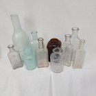Lot Of 10 Embossed Glass Medicine Bottles Lot Apothecary Bottles Amber Blue Clea