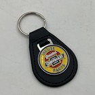 We Use Genuine Chevrolet Parts Vtg Style Sign Metal Enamel Leather Keychain Fob