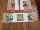 3x Super Mario Bros 40th Anniversary  Promo Gamestop Posters 2 53x9   1 24x7 