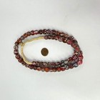 Fancy Floral And Skunk Venetian Red Trade Beads