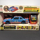 Richard Petty 1 16 Remotecontrol Stock Car Nib And Mounted Autographed Hero Card