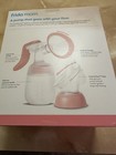 Frida Mom 2-in-1 Manual Breast Pump With Hands-free Silicone Suction Cup  Milk