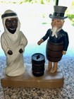     vintage 1975 John Wright Cast Iron Mechanical Coin Bank Uncle Sam   Arab Nice 