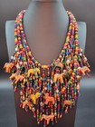 Hand Carved Animal Fetish Necklace colorful Wood Figures   Glass Bead Waterfall