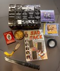 Vintage Collectibles Junk Drawer  Lot Wwii Vhs  Tins  Comic  Knife Ty Cobb Cards