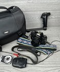 Nikon Em 35mm Slr Film Camera W 50mm 1 8 Nikon Series E Lens Bag And Accessories