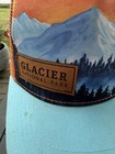 Glacier National Park On Leather Patch On Brilliant Sunset Of Mountain Hat Cap