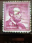 Violet purple Abraham Lincoln 4 Cent Stamp