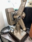 Revere Model 48 - 16mm Film Projector W original Case  Cord  Reel